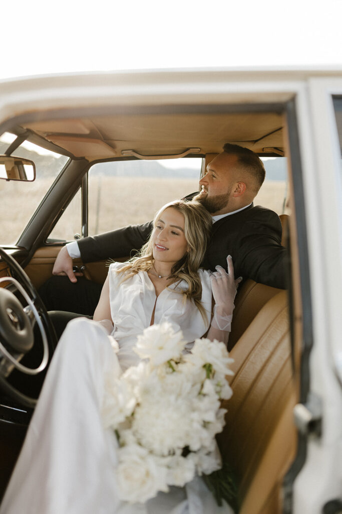 Vintage car engagement photos in Boulder, Colorado