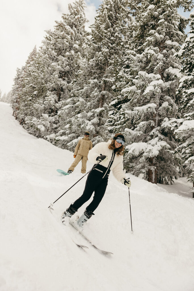 Action shots during some snowy ski engagement photos in Colorado