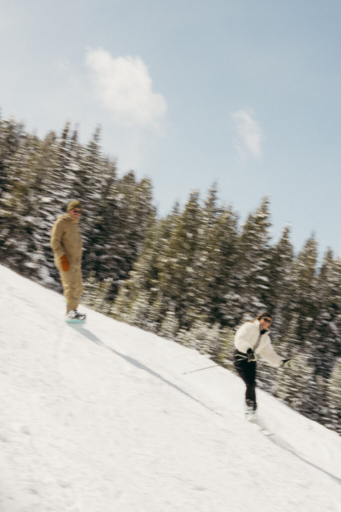 Action shots during some snowy ski engagement photos in Colorado