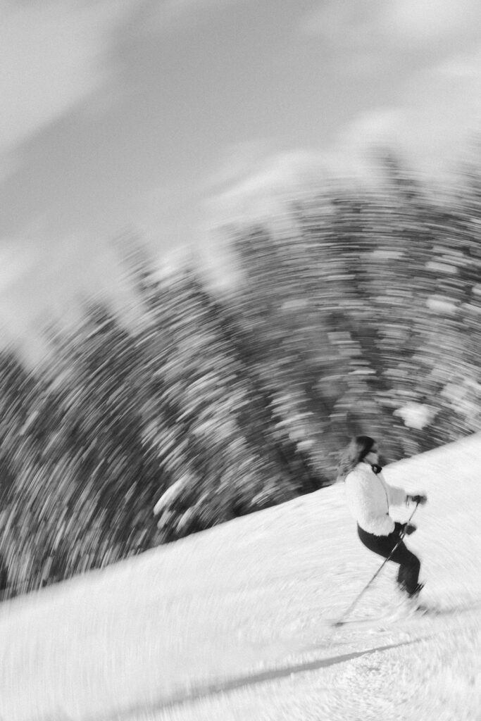 Action shots during some snowy ski engagement photos in Colorado