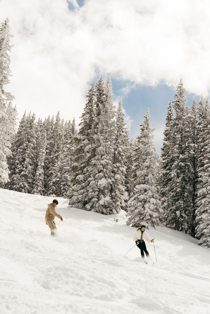 Action shots during some snowy ski engagement photos in Colorado