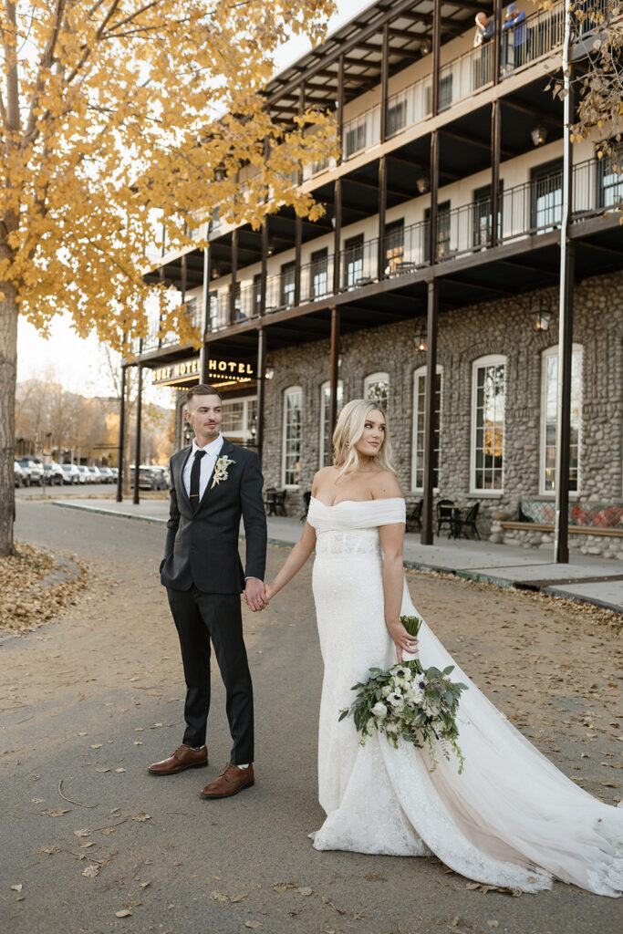 Bride and groom portraits in front of Surf Hotel and Chateau