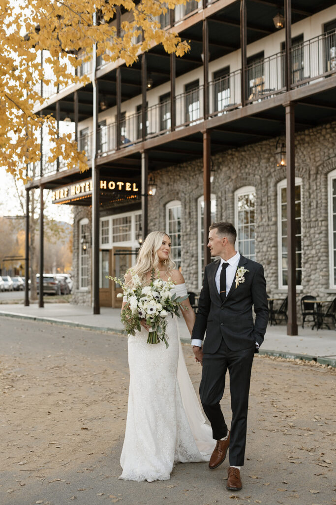Bride and groom portraits in front of Surf Hotel and Chateau