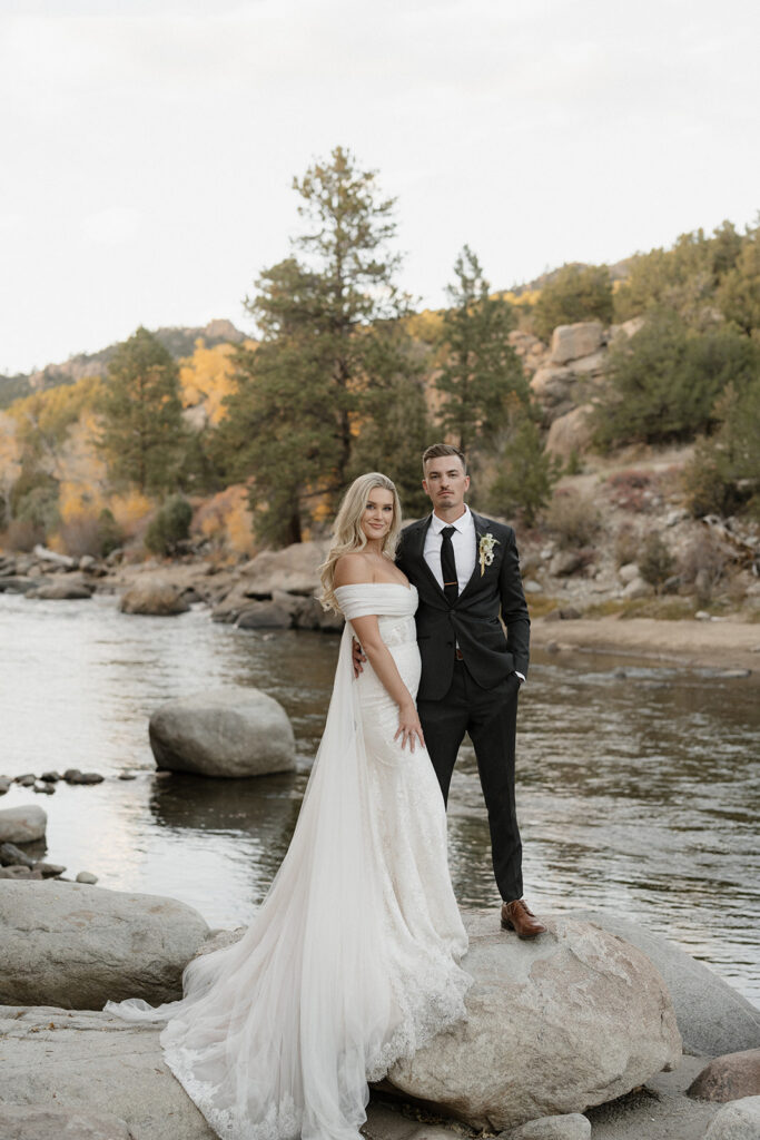 Bride and groom portraits by the Arkansas River at Surf Hotel and Chateau