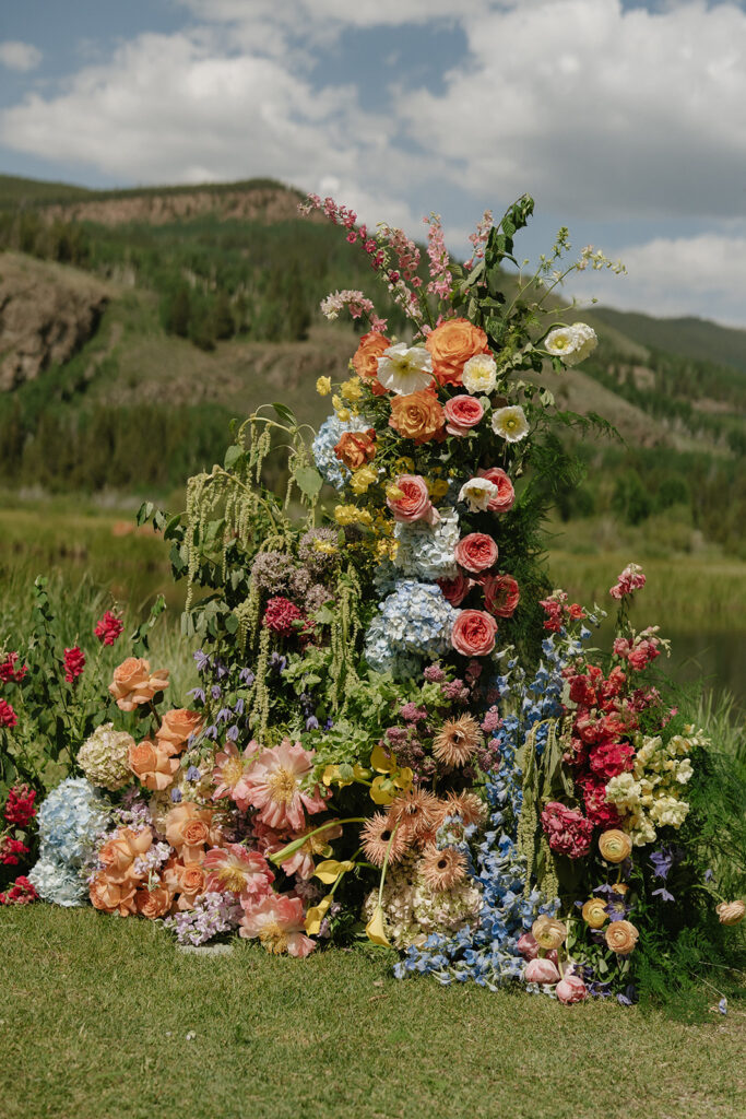 Colorful floral installations at the altar