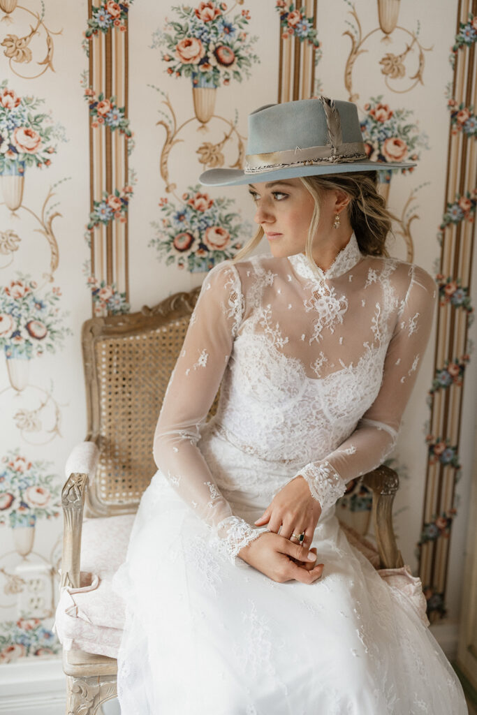 Bride sits in Wheeler Stallard Museum before the Colorado wedding ceremony