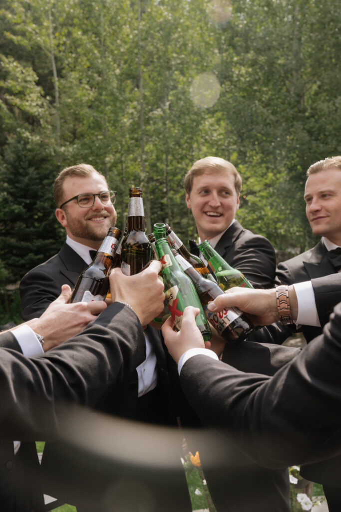 Groom toasts with his groomsmen