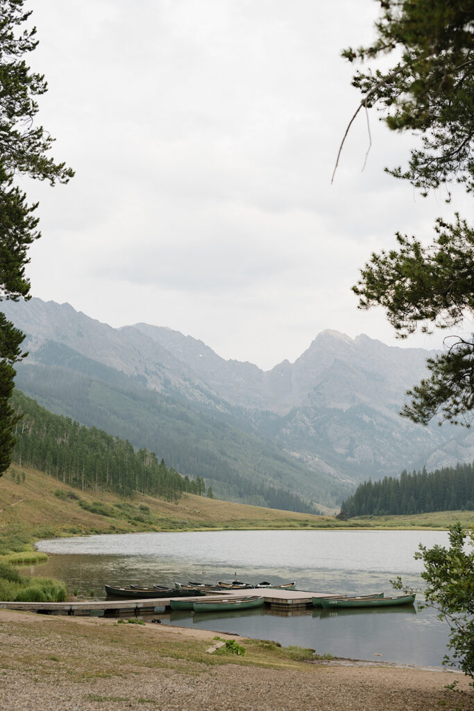 Canoes sit at the dock on Piney Lake