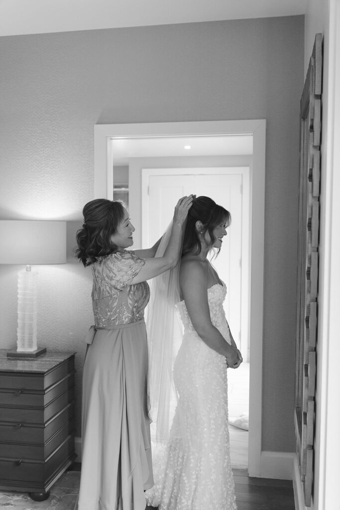 Bride's mother helps put her veil on at the Grand Hyatt in Vail