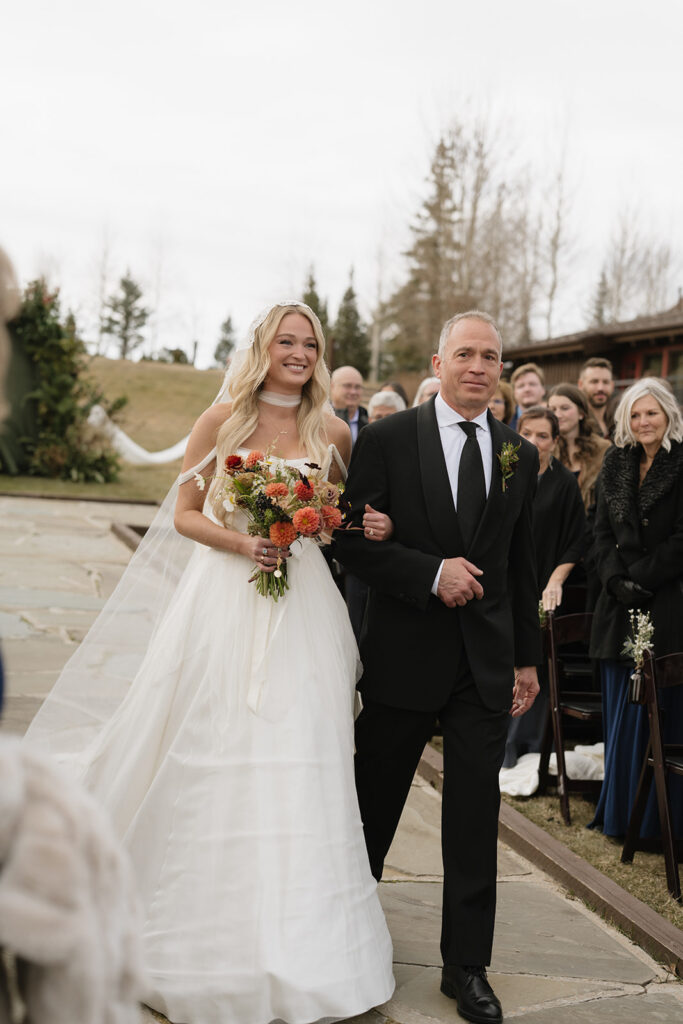 Devil's Thumb Ranch wedding ceremony in the fall