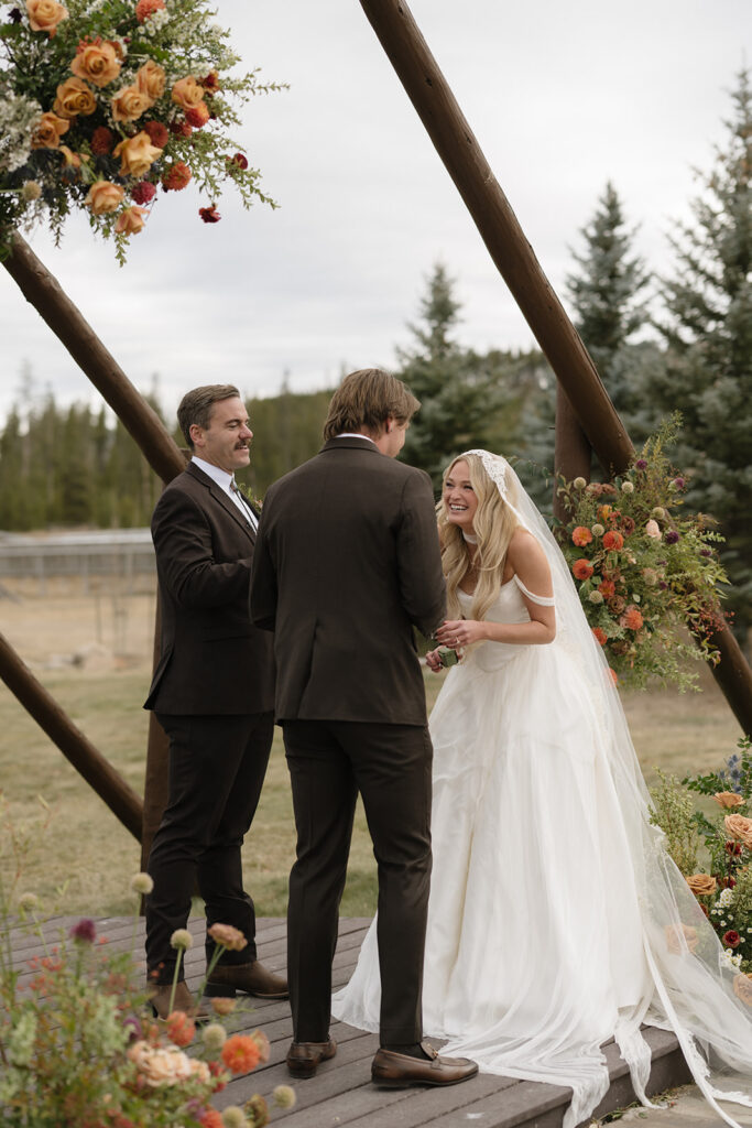 Devil's Thumb Ranch wedding ceremony in the fall