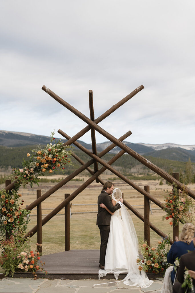 Devil's Thumb Ranch wedding ceremony in the fall