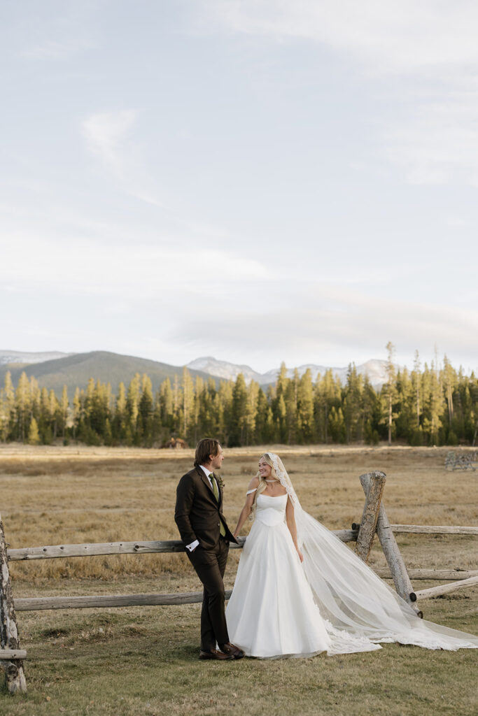 Bride and groom photos at Devil's Thumb Ranch in Colorado in the fall