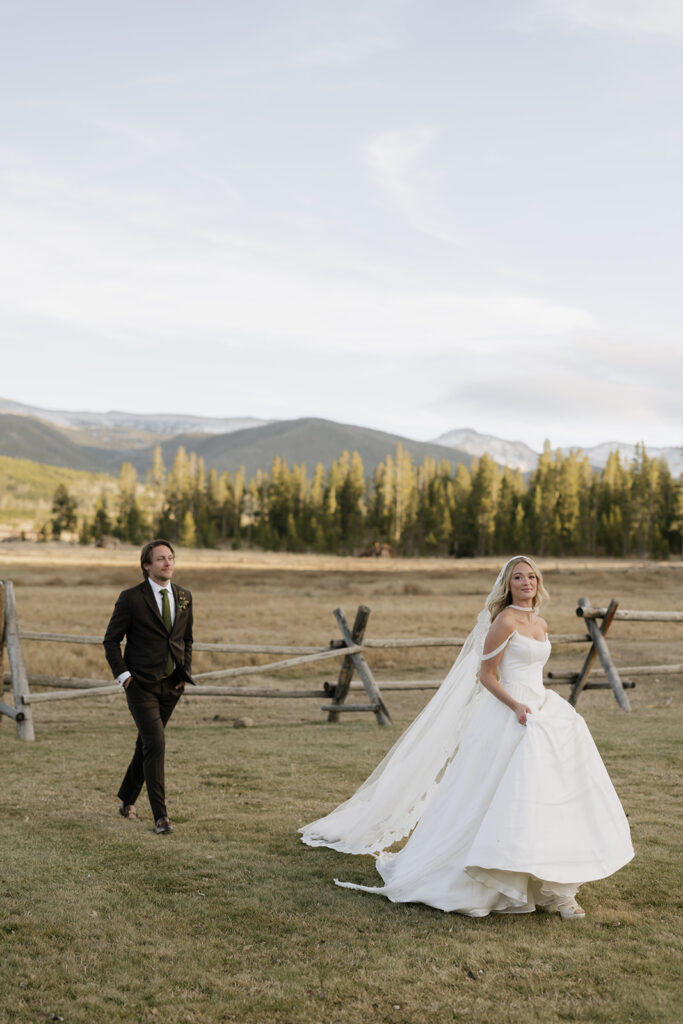Bride and groom photos at Devil's Thumb Ranch in Colorado in the fall