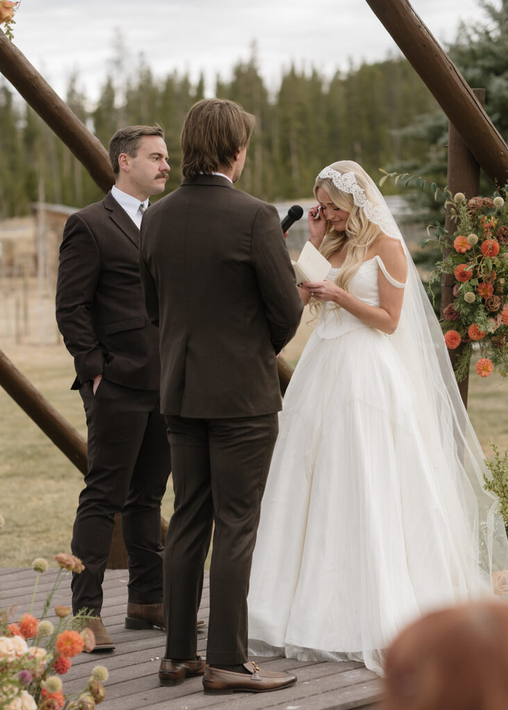 Devil's Thumb Ranch wedding ceremony in the fall