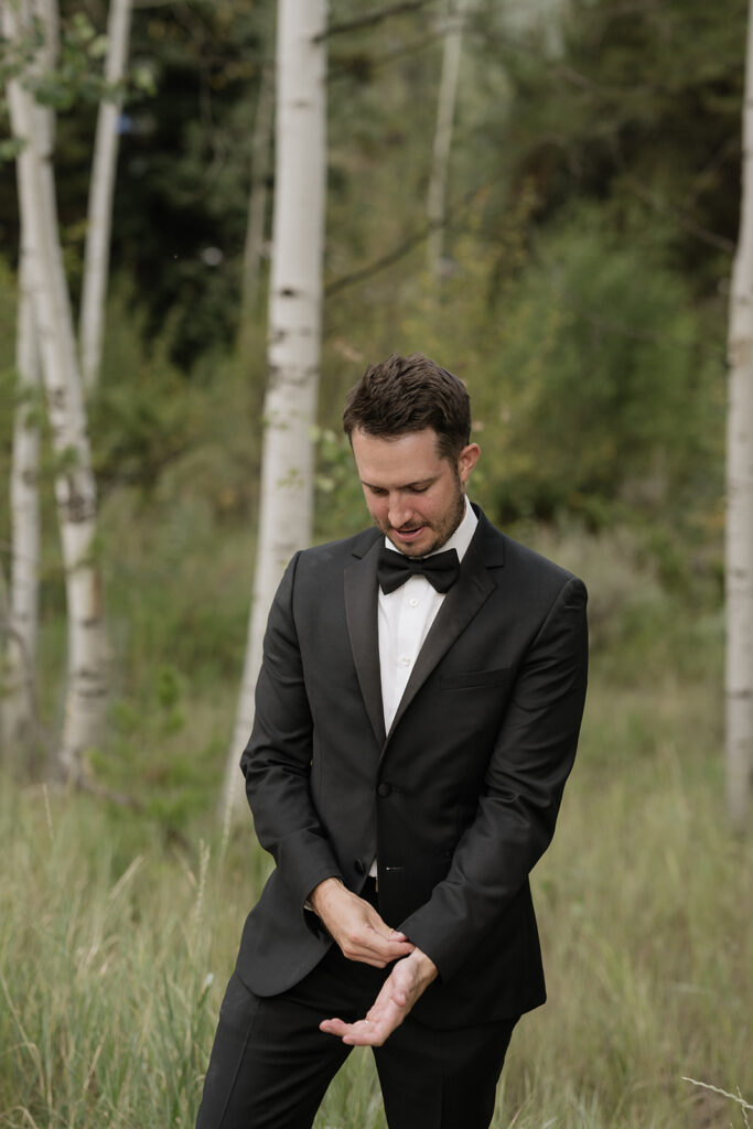 Photo of groom in the alpines in Vail, Colorado