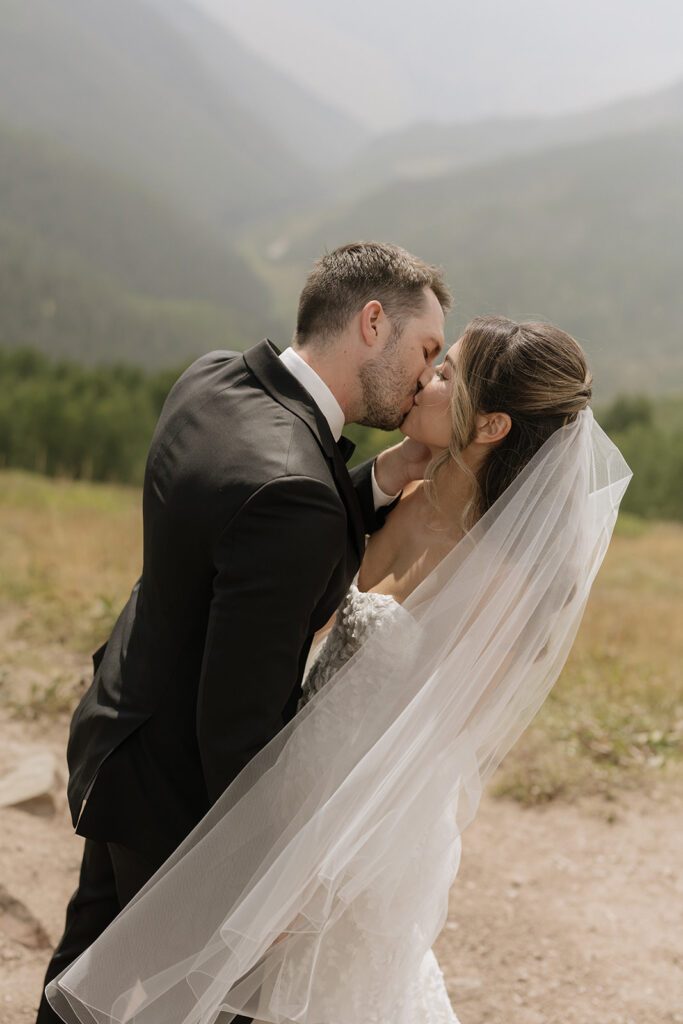 Vail Mountain wedding portraits of bride and groom in smoky haze