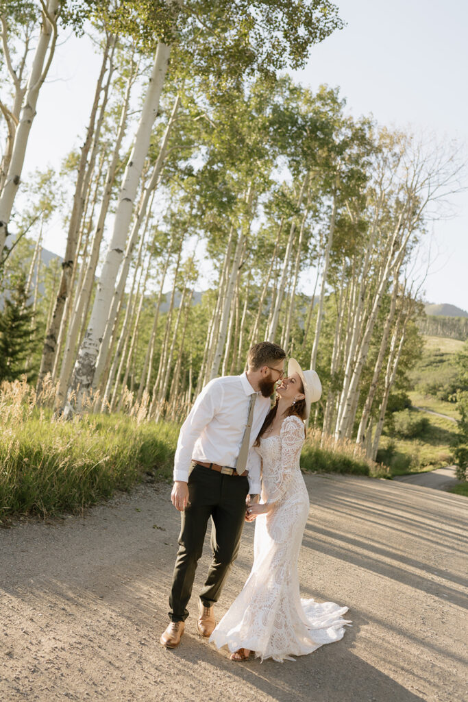 Summer wedding photos of bride and groom in Telluride, Colorado