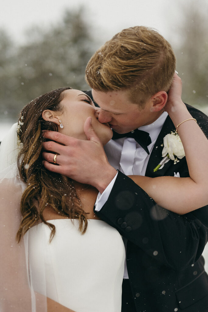 Close-up of bride and groom sharing a quiet moment during Colorado winter wedding