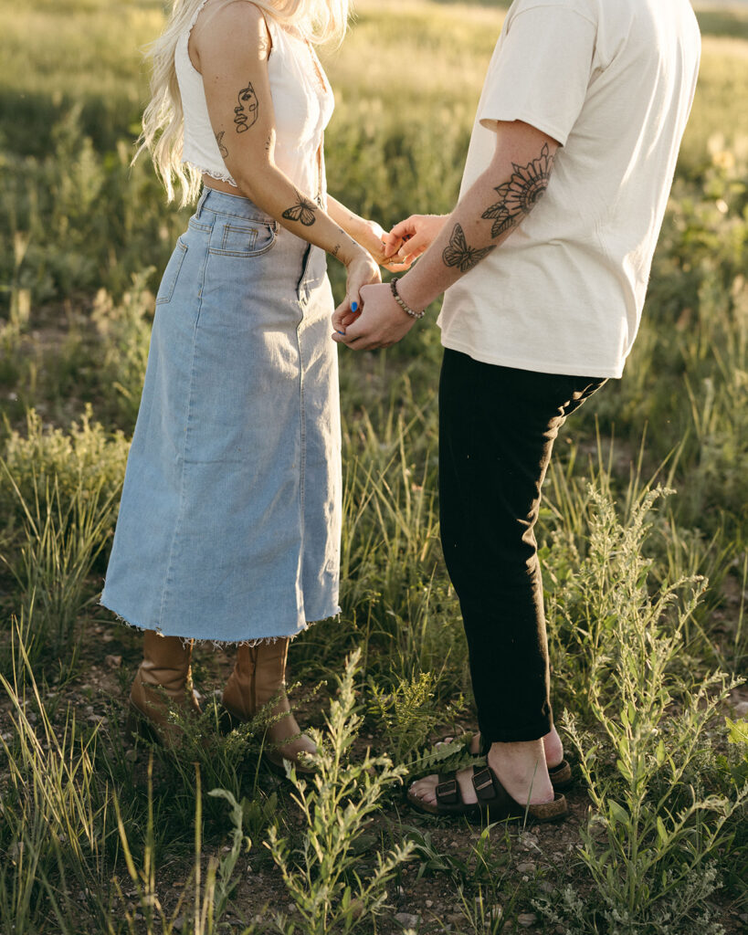 cinematic summer engagement photos in Boulder Colorado tall grass