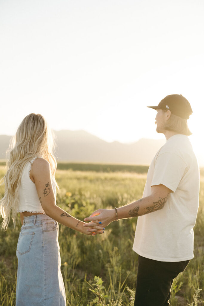cinematic summer engagement photos in Boulder Colorado tall grass