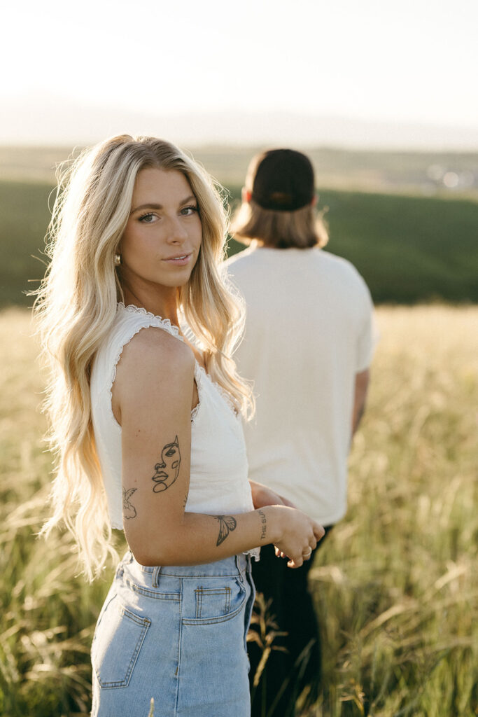 cinematic summer engagement photos in Boulder Colorado tall grass