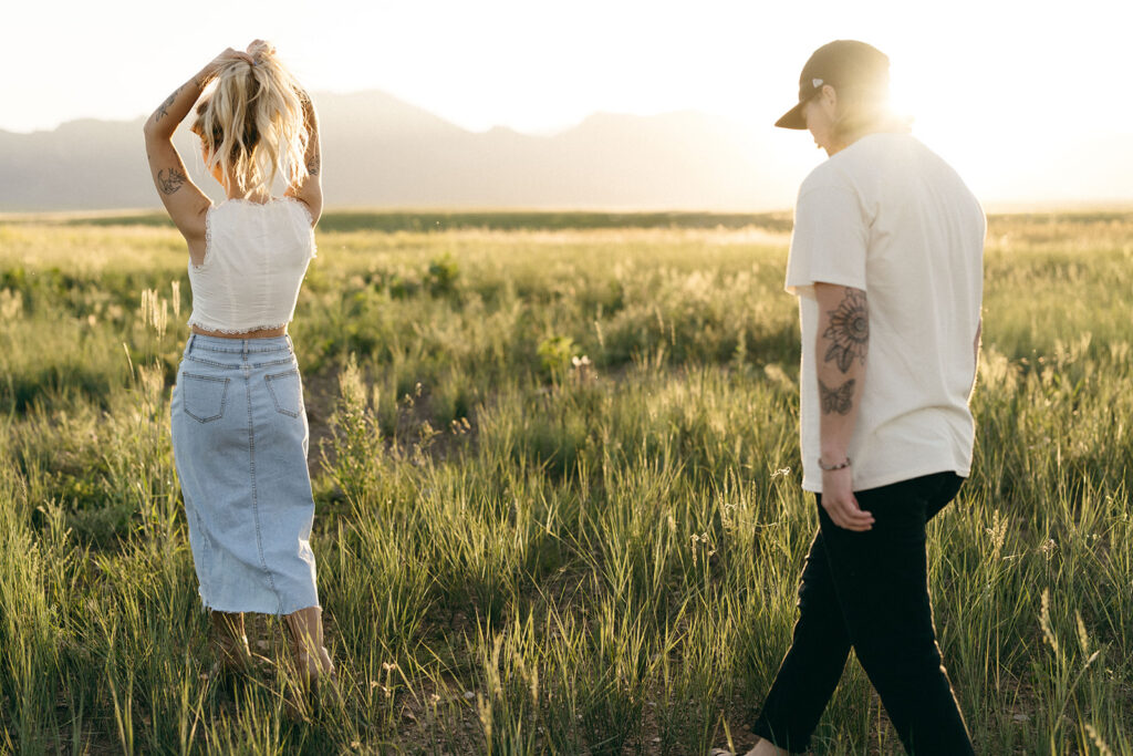 cinematic summer engagement photos in Boulder Colorado tall grass