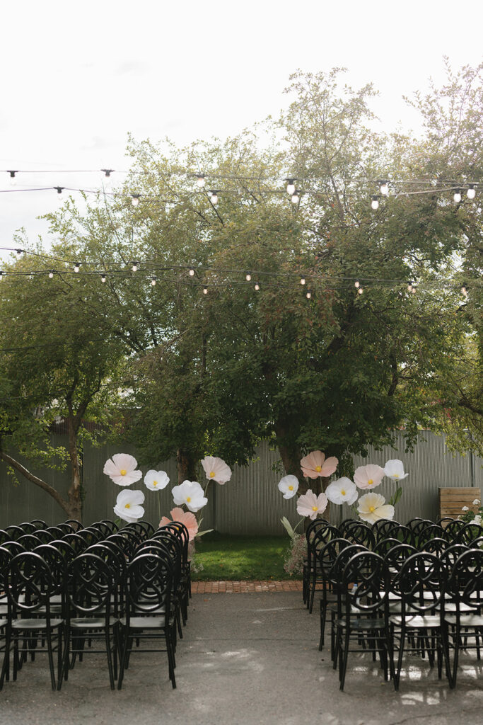 Giant paper flowers at the altar