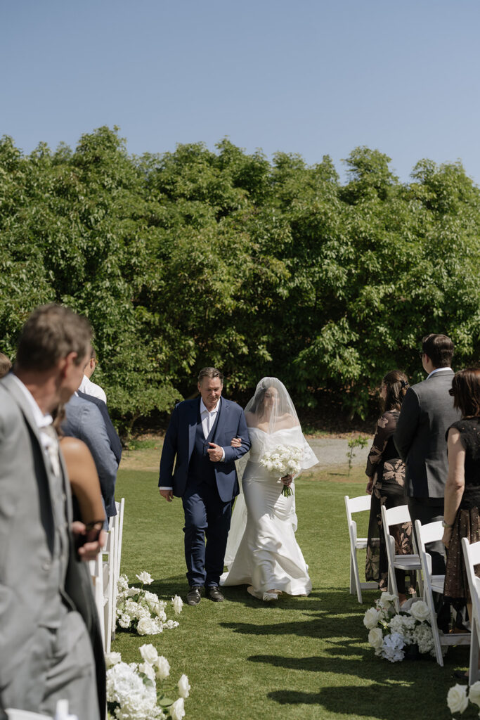 Sunny, summer Rancho Guejito wedding ceremony in San Diego