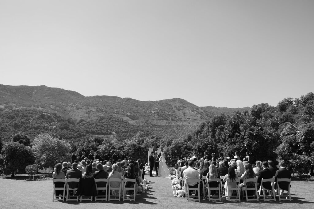 Sunny, summer Rancho Guejito wedding ceremony in San Diego