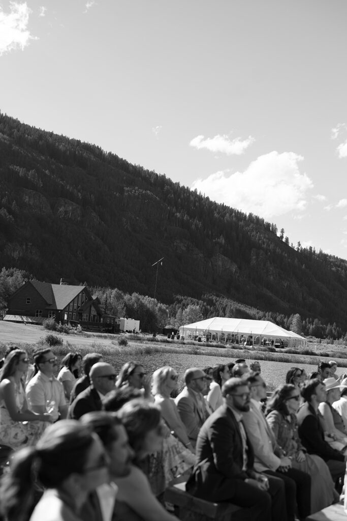 Guests sitting during a Camp Hale wedding ceremony