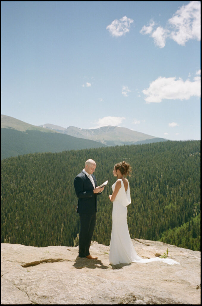 Private vows in Idaho springs with a vast mountain backdrop captured on film