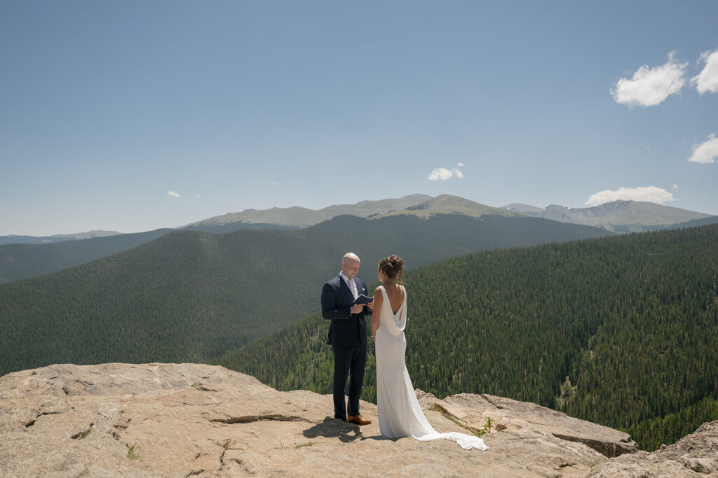 Private vows in Idaho springs with a vast mountain backdrop