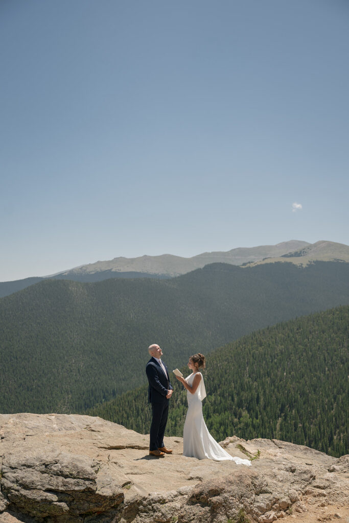 Private vows in Idaho springs with a vast mountain backdrop